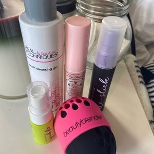 Lot of makeup setting sprays, and brush cleaners
